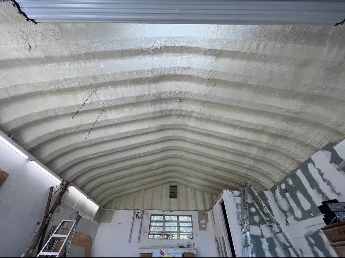 Spray polyurethane foam applied to the underside of a metal roof deck in Valle Vista